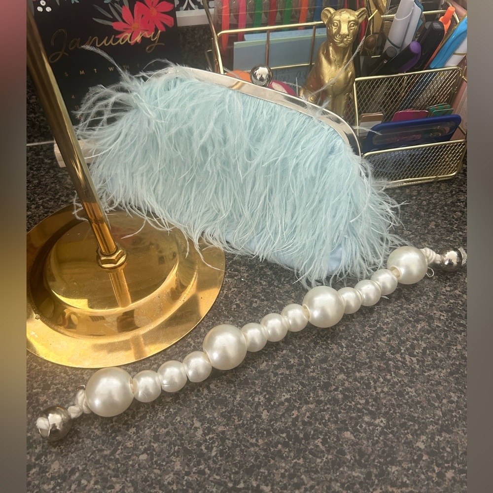 Elegant Feathered Clutch with Pearl Handle